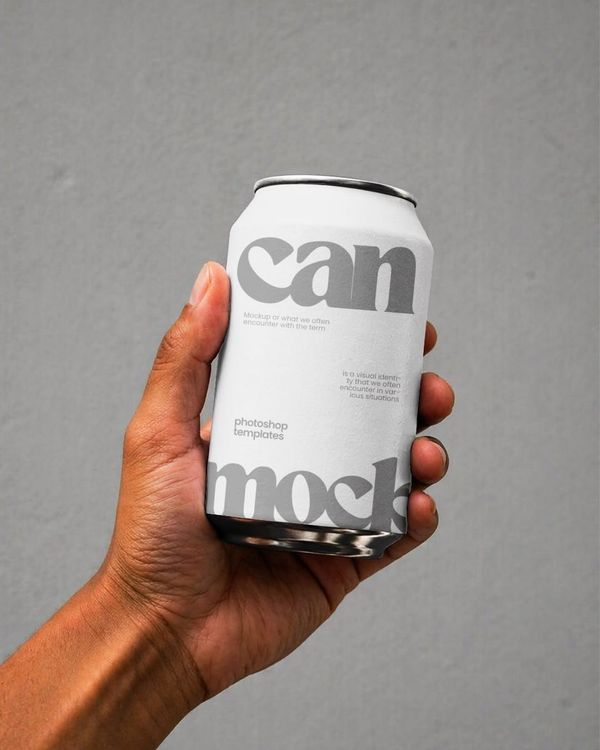 Hand Holding Aluminum Beverage Can Mockup