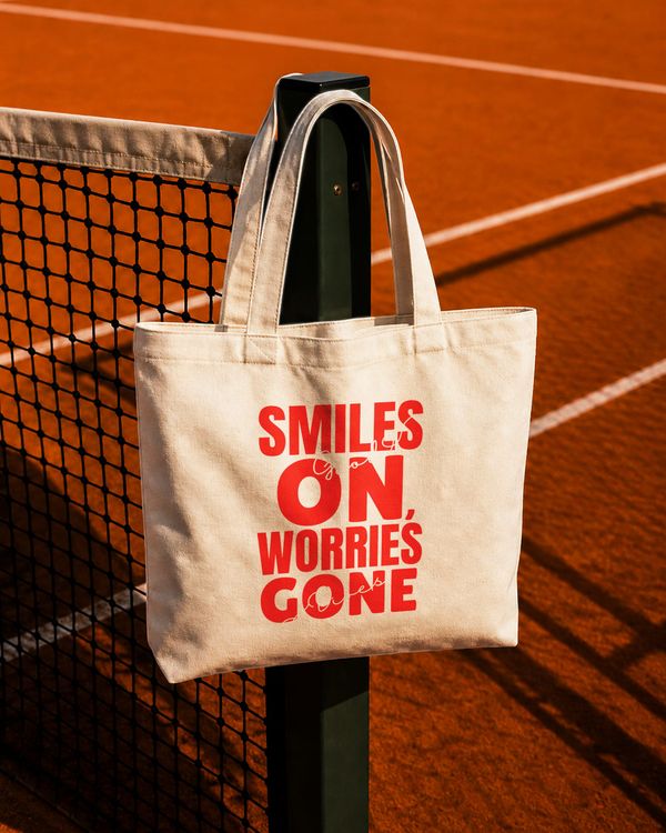 Canvas Tote Bag Branding Mockup Hanging on Tennis Net Post
