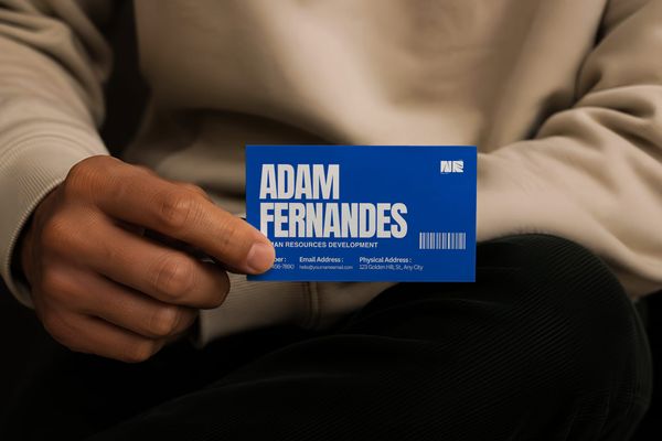 Hand Holding Business Card Mockup in Lifestyle Scene