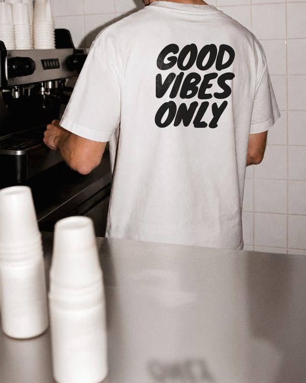 Back View T Shirt Mockup Coffee Shop Lifestyle Scene