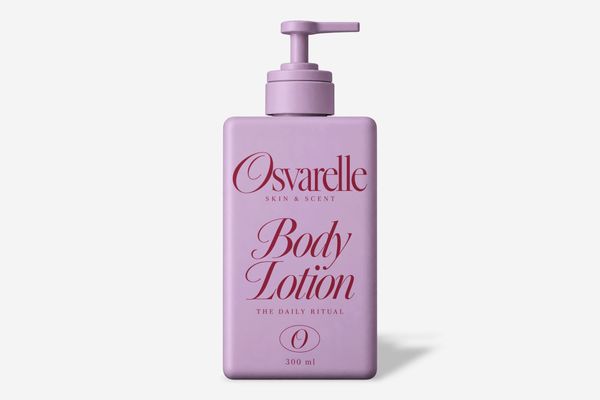 Lavender body lotion pump bottle mockup with elegant skincare branding on a light gray background.