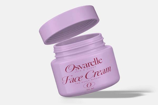 Lavender cosmetic jar mockup with an open lid and burgundy face cream branding on a light gray background.