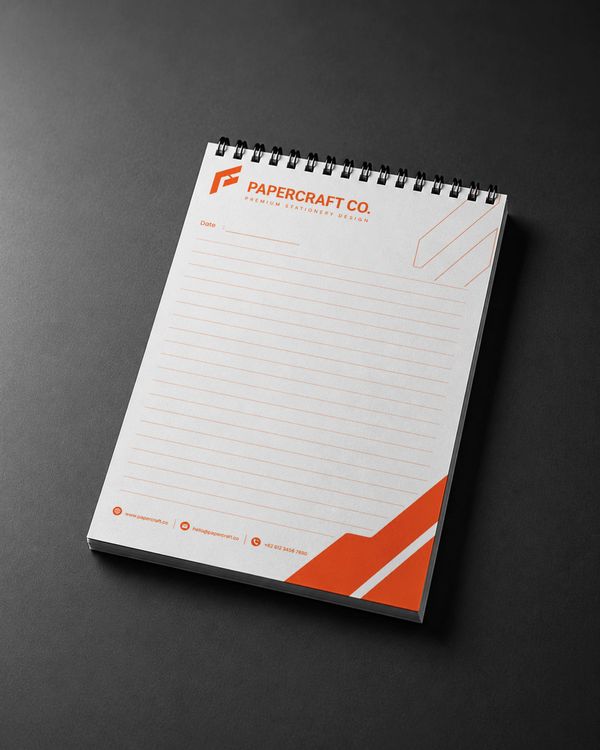 Premium spiral memo pad mockup with lined paper, realistic texture, and modern corporate stationery design.
