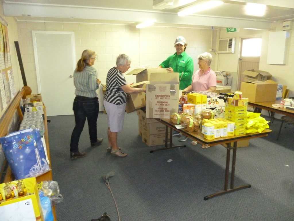 Unpacking drought relief items at St Brigid’s Hall, Longreach