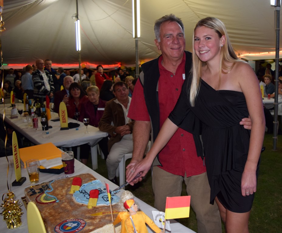 The beach themed cake was cut by Courtney McCarthy, who gained her bronze during the 2014/215, and newest life member, Ron Organ