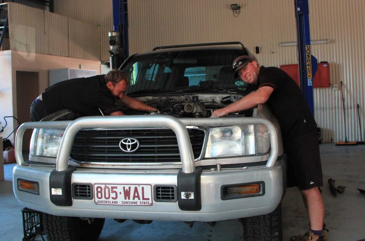 Allan Roberts and Dave Elder busy in the workshop of Rainbow Beach Automotive Image Barb Rees