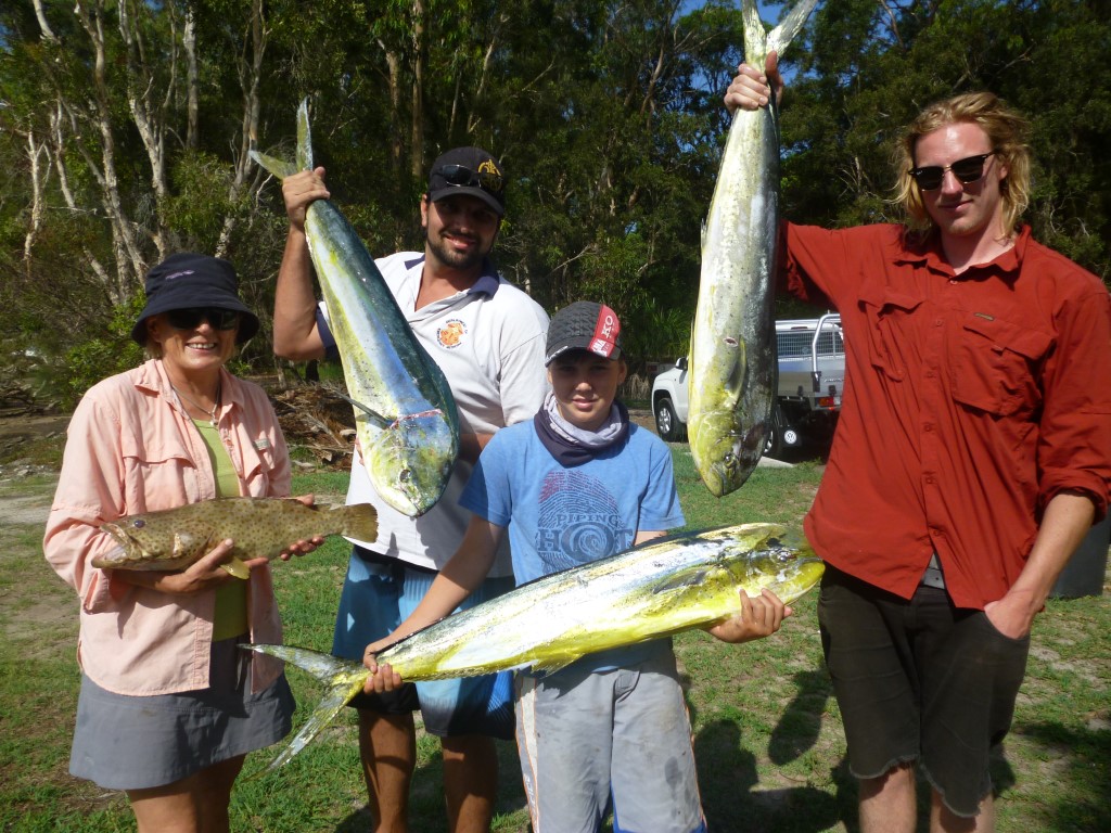 Locals Paivy, Brad and his son and a successful overseas visitor