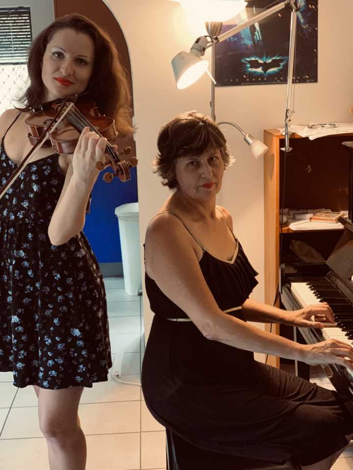 Violinist is Helen Brereton and the Pianist is Irina Prodger