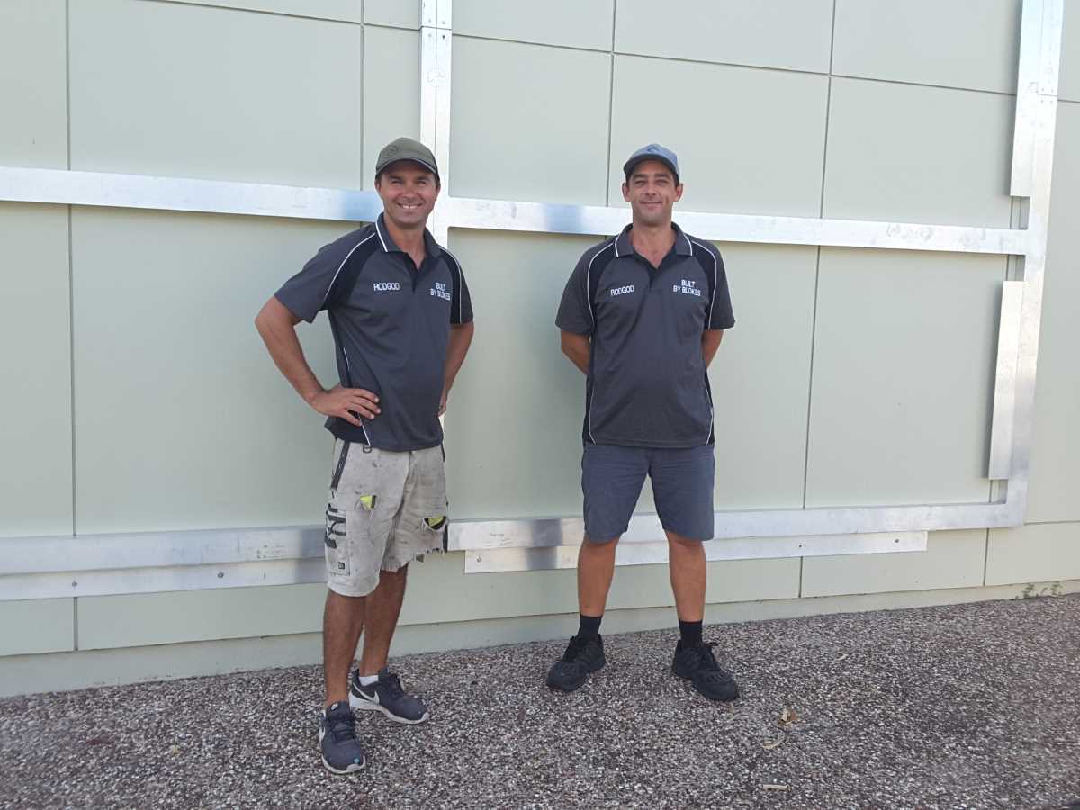 Built By Blokes to the rescue! Aaron and Chibi have joined the project to assist with securing the trial artwork to the rear wall of the Rainbow Beach Community Hall