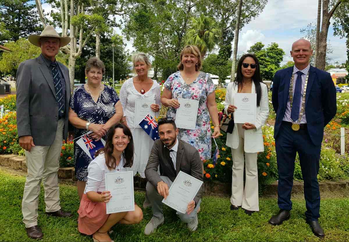 Back (L-R) - MP Tony Perrett, Lorraine Engelbrecht, Yvonne Read, Tina Mahaffey, Riza De La Cruz Doran, Mayor Glen Hartwig  Front (L-R) - Fabiana Oppini (former resident) and Vincenzo (Enzo) Ronca