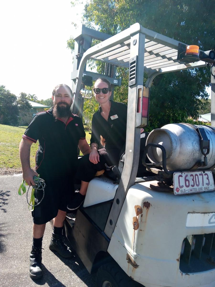 The wonderful Kristie and Ben from IGA moving the refrigerator that was kindly donated by Debbie Gordon of Frying Fish Cafe