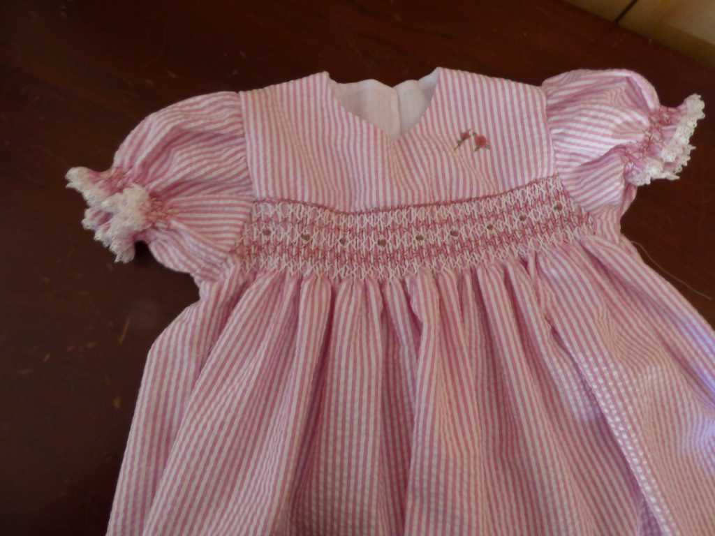 Jan Low made this pretty child's dress with smocking needlework