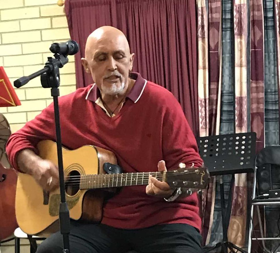 Laurence is new to the group, pictured performing an Hawaiian song