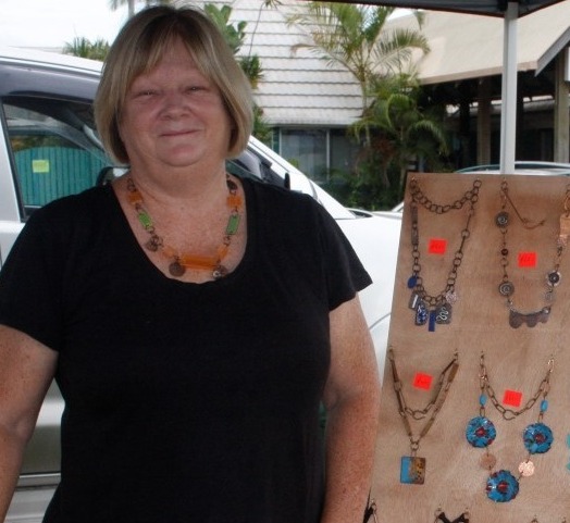 Debra Gardiner and her creations - some in copper and silver and others moulded in resin from vintage buttons, even miniatures of her daughter's art