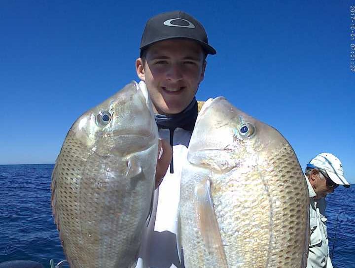 Joel with a couple nice Rainbow Beach sweetlip