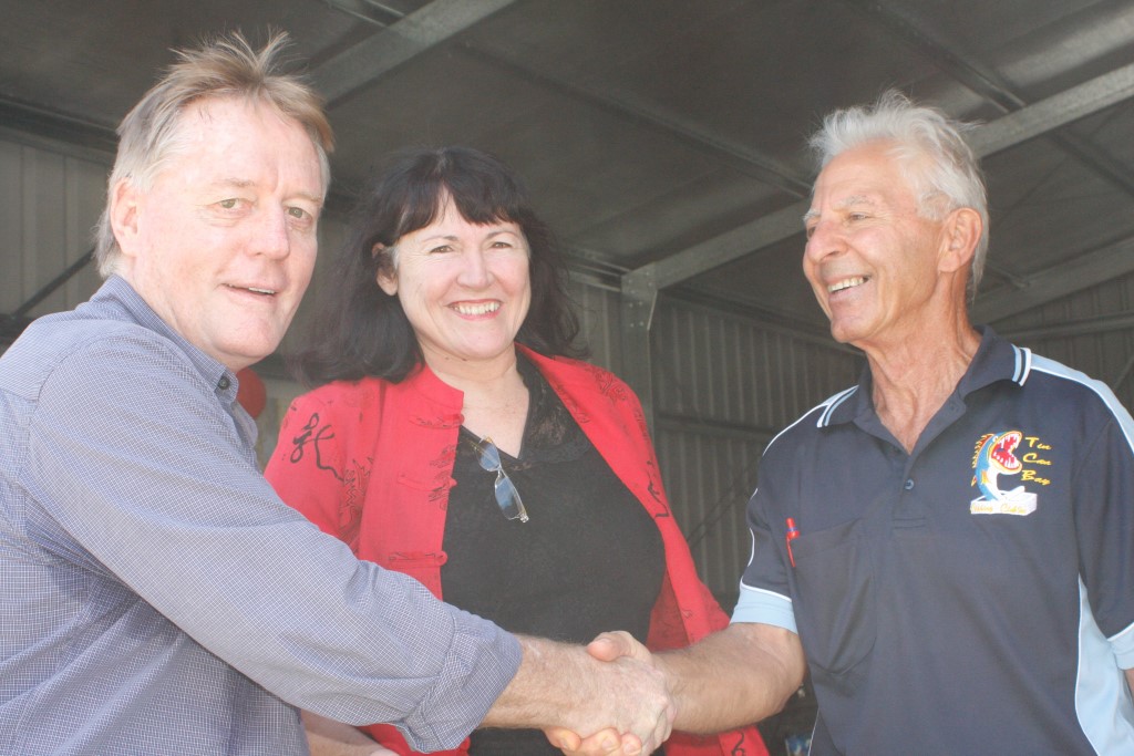 Cr Mark McDonald and Acting Mayor, Rae Gate, congratulate Jim George and the Fishing Club