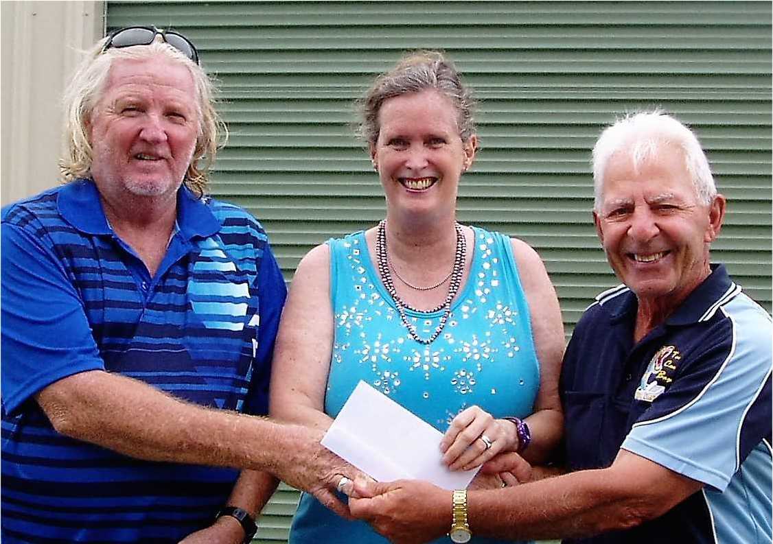 Margie Moore and Mark Wotherspoon of TCB won First Prize in the Club’s Raffle are presented with a cheque for $1000 by President, Jim George