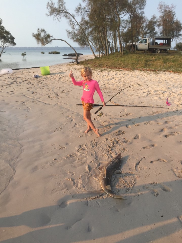 Elora, grand-daughter of club member, Jane Potter, on a recent holiday in Tin Can Bay learns how to fish