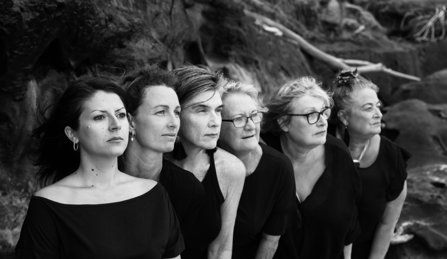 Some of the organisers of the Ladies Day 2020 Rainbow Beach - Elisa, Sarah, Michelle, Sue, Rose, Lee standing together for International Women's Day