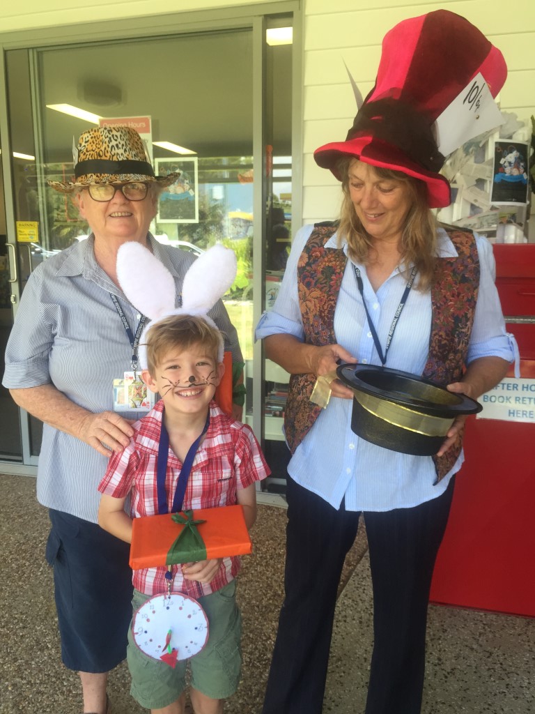 Librarians Caroline Taylor and Jenny Tanner with Kye Feeney who won the best dressed