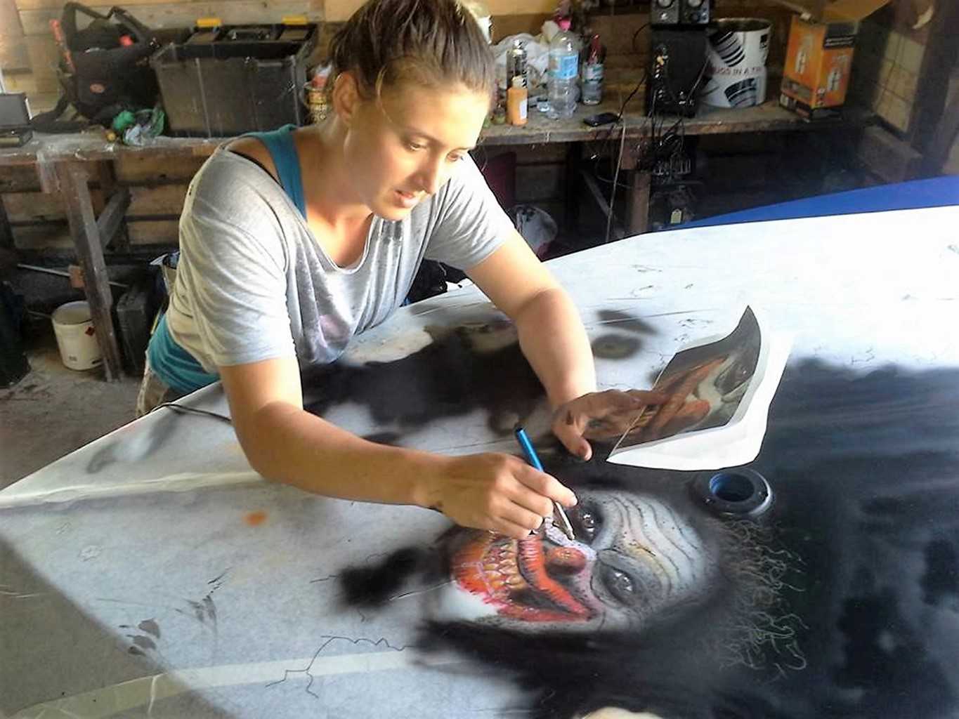Kandanga artist Holly Hughes will return with a unique new art concept – using ultraviolet paint on surfboards to celebrate o