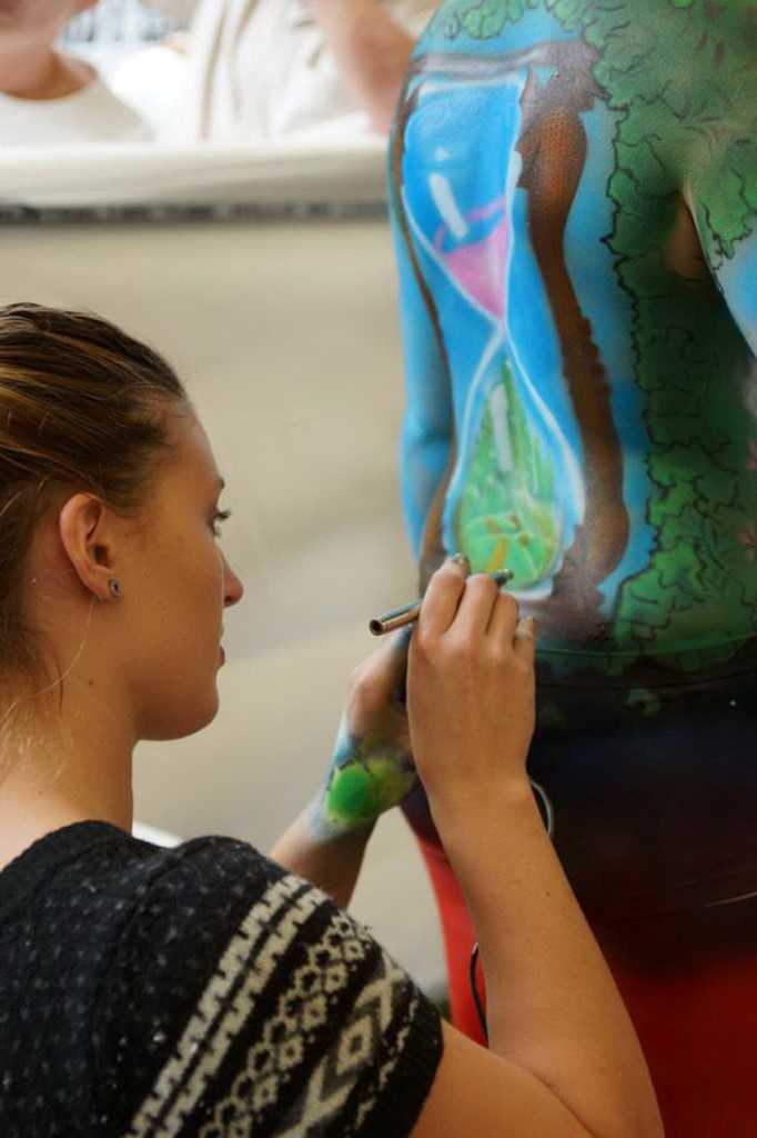 Repeat winner at the Mary Valley Art Festival is Holly Hughes, pictured creating body art