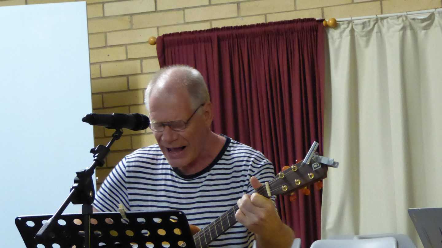 Gunther Vollmer on guitar and vocals at Music Plus