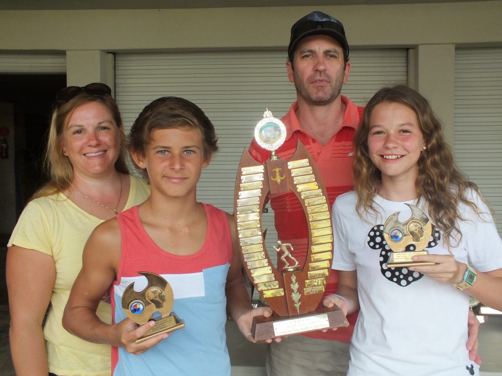 Nippers no more: U14 Age Champions Jackson Dawkings and Kate Gilmore with sponsors Caroline Vielle and Heatley Gilmore