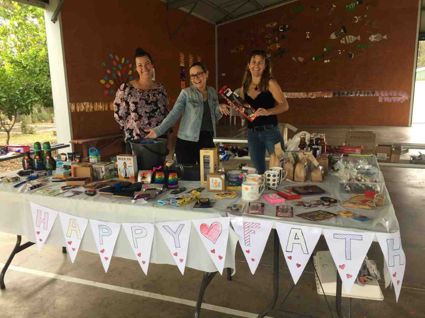 P&C mums, Sandra Lindenberg, Megan Braunberger and Marissa Powers, helping out on the Mother’s Day Stall at Rainbow School 