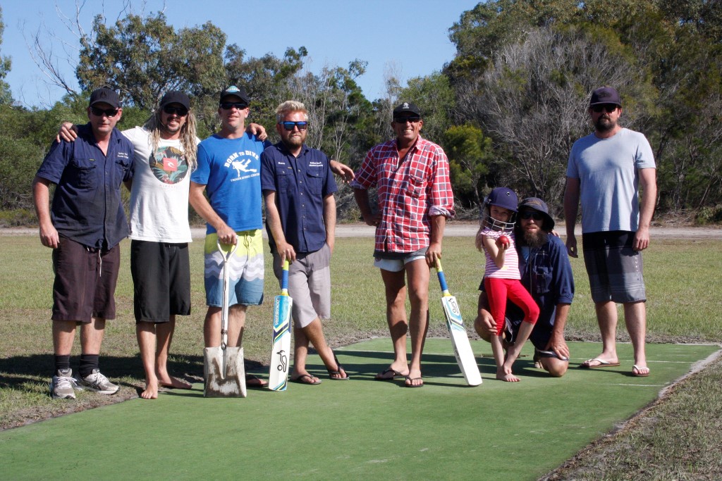 Shane Irving, Luke Simpson, Craig Killalea, Steve Hiley, Murray Everett, Daisy and Merv O'Neill and Darren Timms have been preparing the pitch and extending the Rainbow Beach cricket field - ready for play most Saturdays this month!