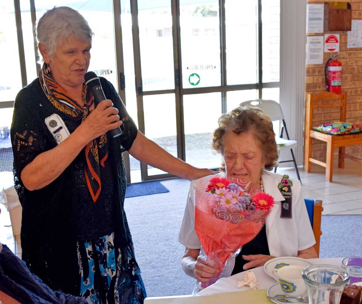 Joan Barnier presents Francis Sheppard with her birthday flowers - congratulations on 91 years!