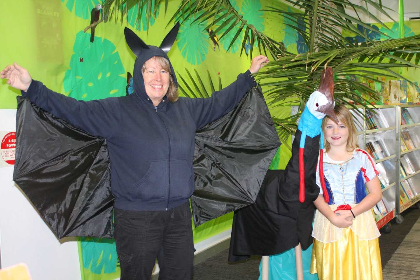 Mrs Theresa Dargusch or "Batty" from Fern Tree Gully, created a Reading Rainforest at RBSS Library - with a snake "Snow White" Lily very impressed with the cassowary 