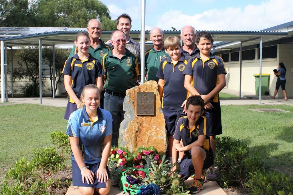 RSL members Bob Bliss, Joe Casey, John Molkentien and Barry Hogan attend the ANZAC ceremony with principal Michael Grogan and student leaders