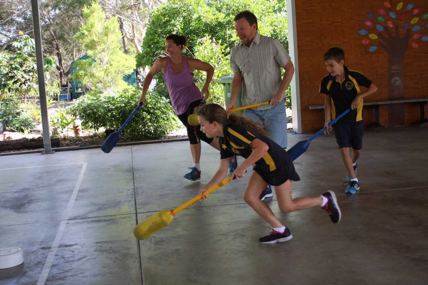 Principal Dan Stanieg joined in with ‘giant hockey’ at Fitness Club with one of the organisers Sarah Booth, Alex and Sophie.
