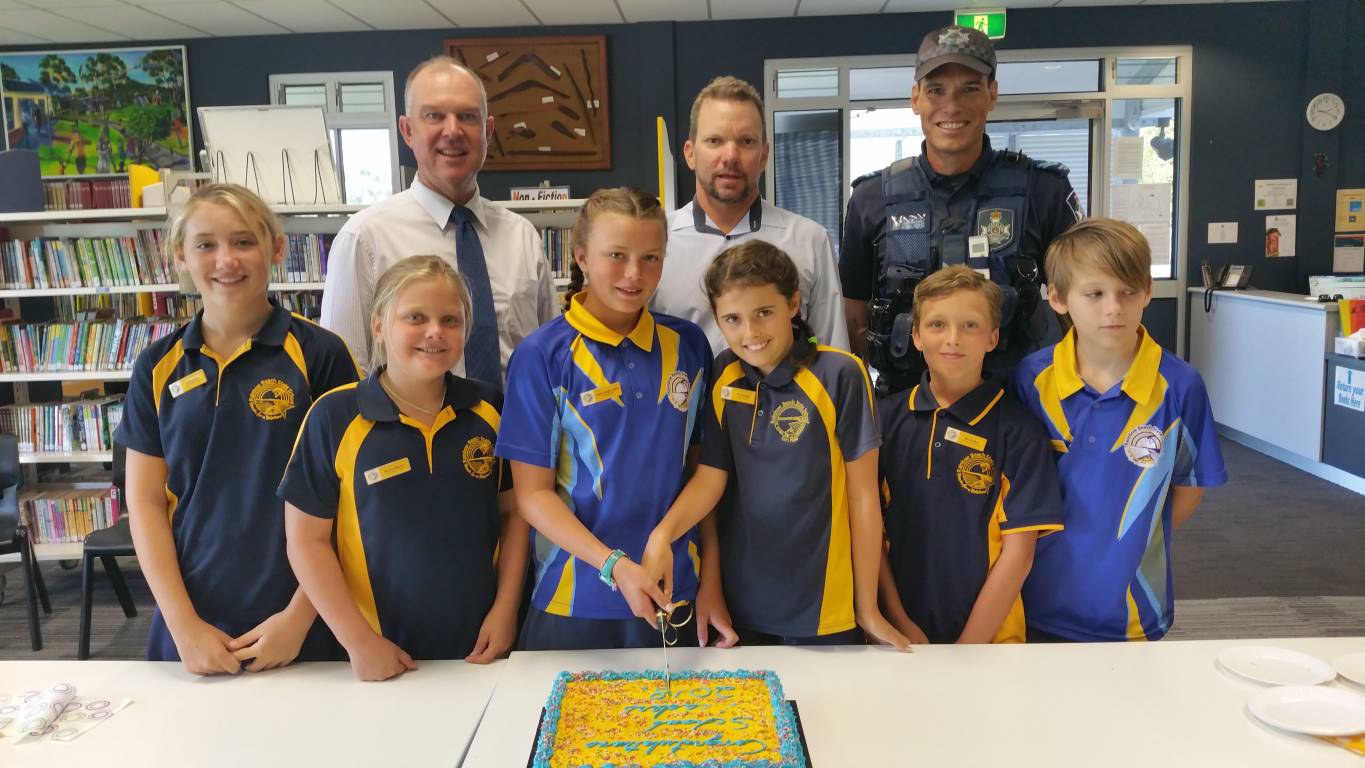 Tony Perret, Principal Danny Stanieg and Michael Brantz congratulate school leaders, Laila, Mason, Luxie-Leigh, Tia, Max and