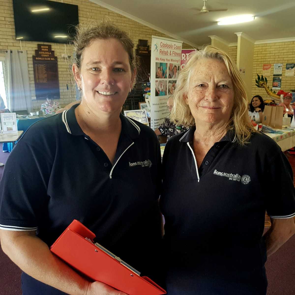 Tin Can Bay Lions Jess and Kerry in action assisting with feedback forms