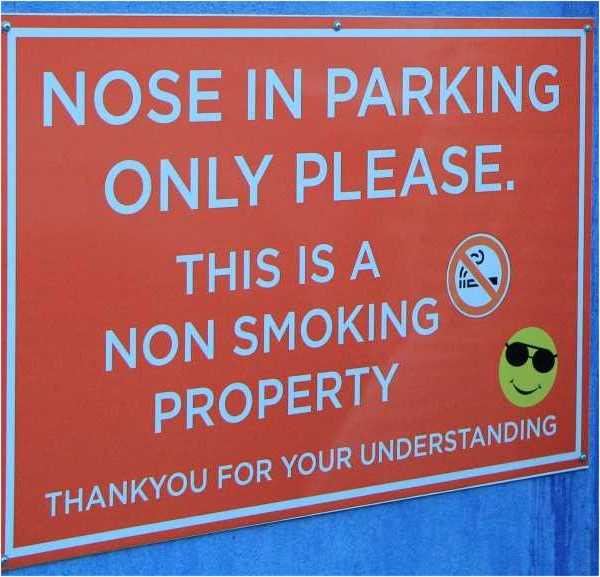 Signage outside the Top Shops in Rainbow Beach has decreased smoking at the venue, cigarette butt littering, and complaints f