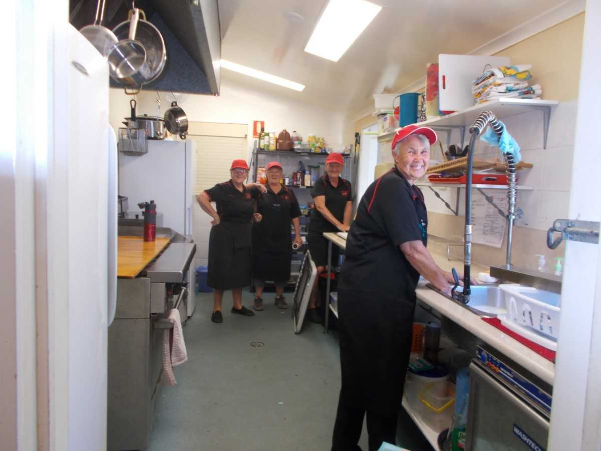 Tired but happy Dragons cleaning up after a busy morning in the Dragon's Lair Cafe at the TCB Markets. L to R: Sandra Wooster, Sandra Binnie, Kerri Southern, Dianne Norris
