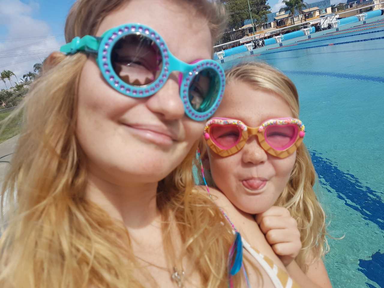 Suitable for all ages, Cyndari and Jahli model "Blue Chill" and "Gelato Girl Baby Pink" Bling2O goggles, available now at the Rainbow Beach pool. (Plus a big happy birthday to Cyndari who turned 18 last month!)