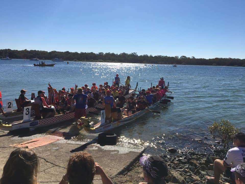 Dragon boats loaded and ready to go on Snapper Creek