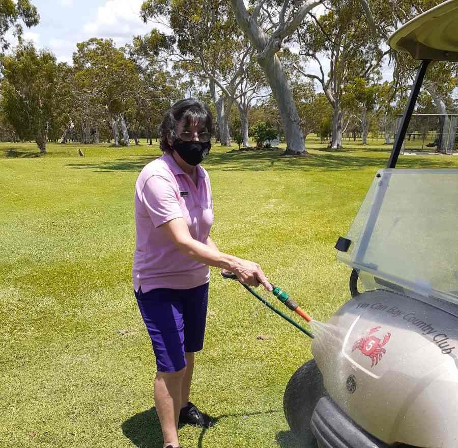 Pro Shop employee Phil Poldervaart employee taking care of the hire buggy