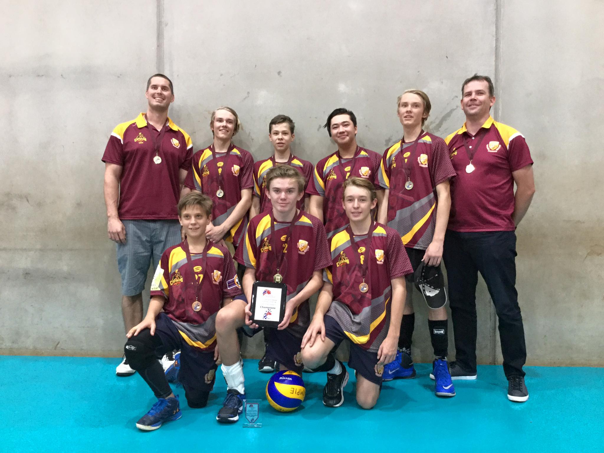 The boys’ team and coaches after the winning volleyball match in Toowoomba