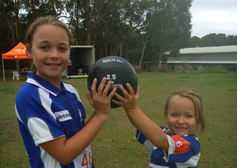 Geurt sisters Anjelica and Amanda have a ball at Little Athletics
