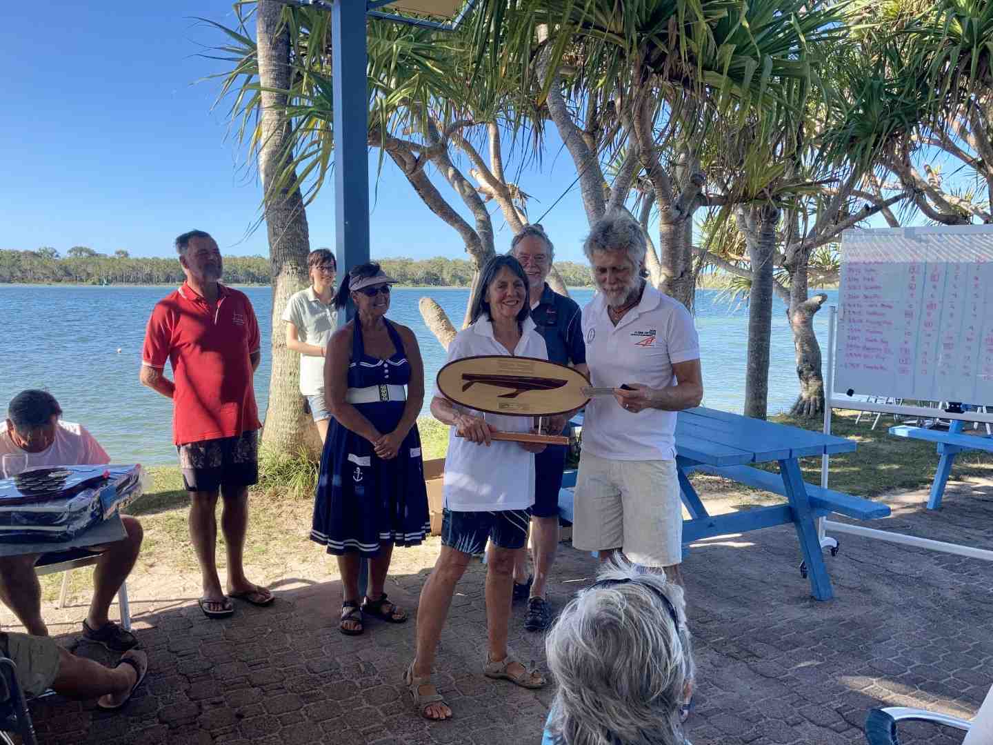 Tin Can Bay Yacht Club - Di and Graham Lee receiving the Handicap award