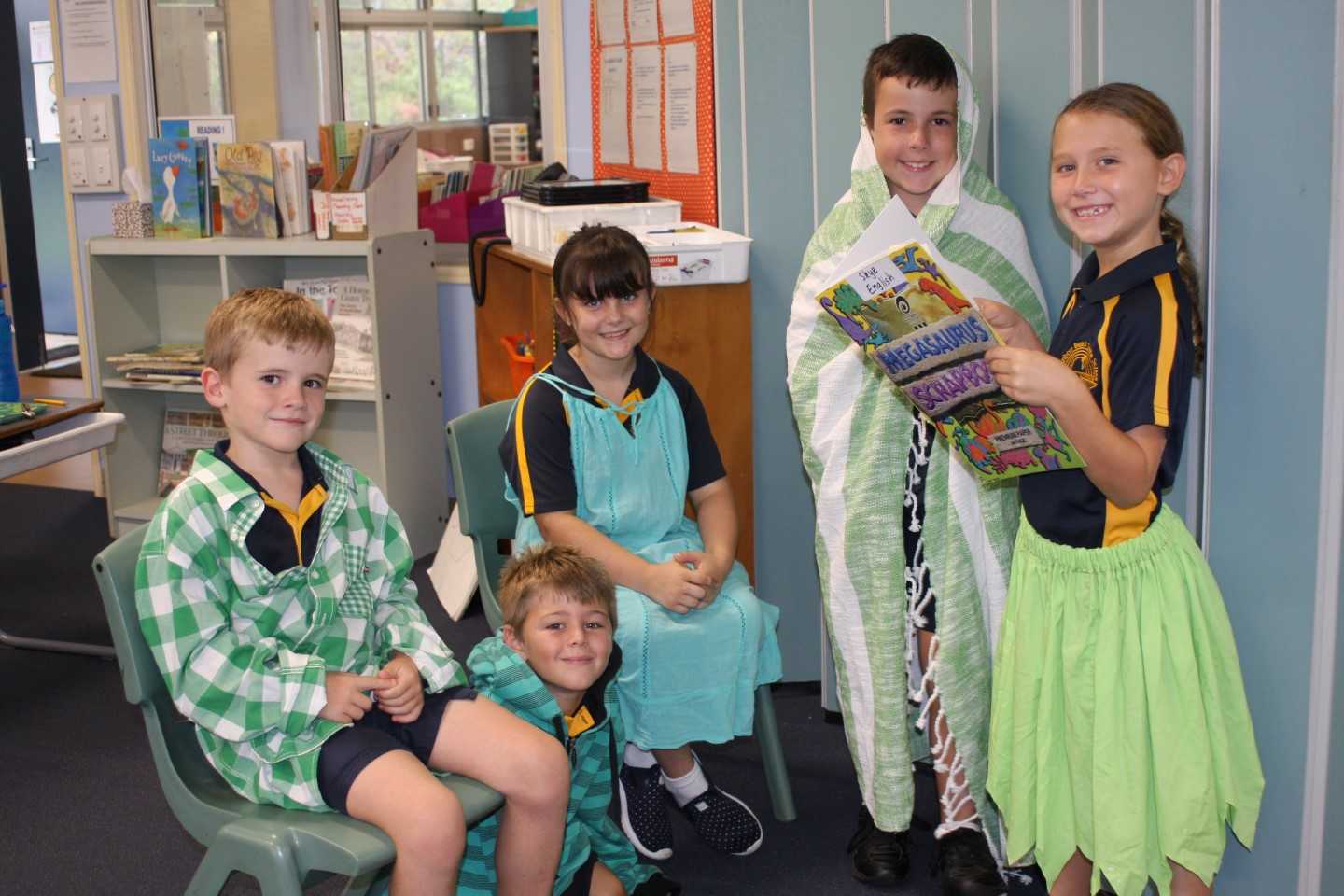 Students at Rainbow Beach State School, Darcy, Jimmy, Delilah, Murphy and Skye look forward to presenting limericks on St Patrick’s Day 