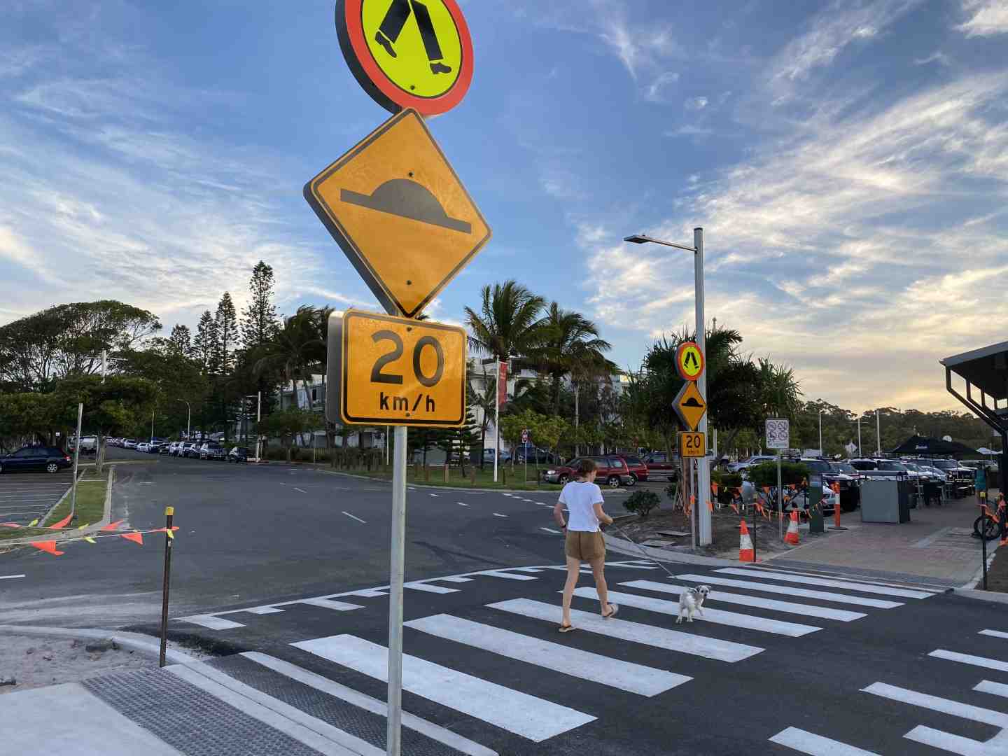There are no STOP signs now at the pedestrian crossing closest to the Surf Club car park - instead GIVE WAY from Rainbow Beach Road