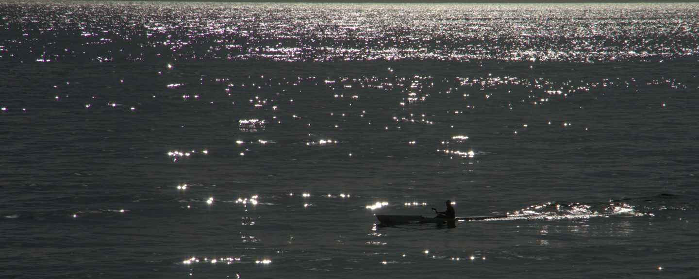 Our Photo of the Month by Garry Hewitt: Brad Hethorn on an early morning ocean paddle - if you love photography come to a free Sunset Instameet, Rainbow Beach 5pm – 6pm