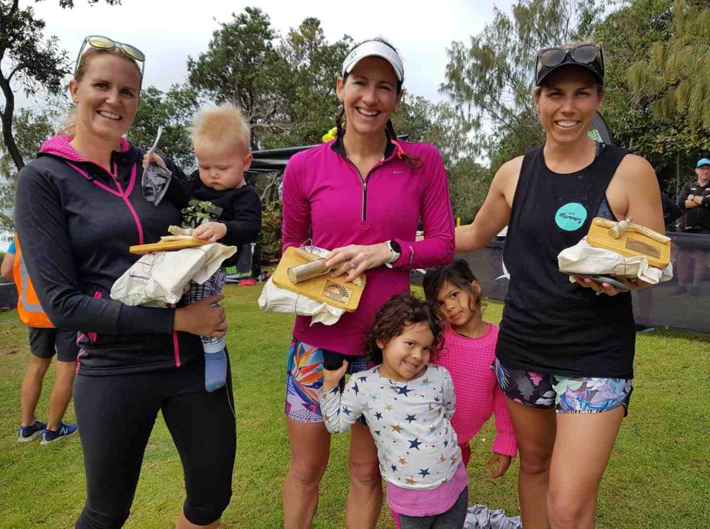 The Rainbow Beach Trail Festival women's half marathon winners Elly Marie, Michelle Bremer and Lauren Ormsby, who were met af