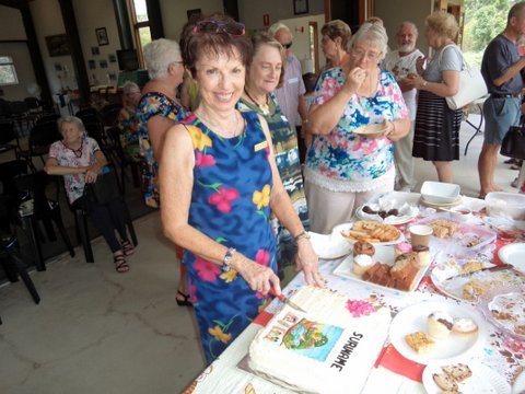 Madonna Hope cutting the Suriname cake at the 2019 World Day of Prayer with Jeanette Murray, one of the organisers for the 2020 Service, and Eveline Crase