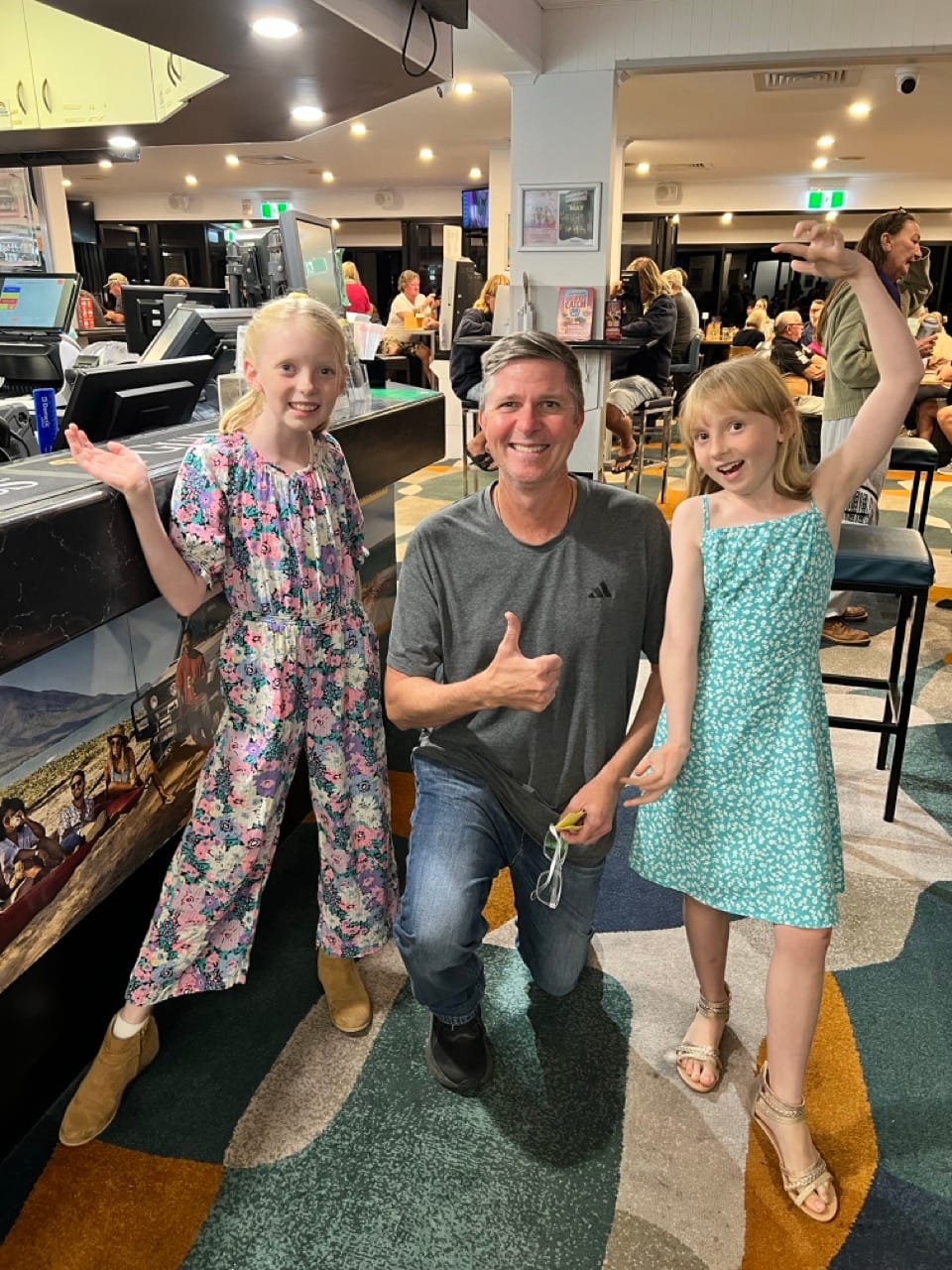 Happy raffle winner Andy and his cheer squad.